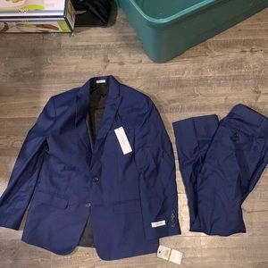 Blue Calvin Klein suit pants and jacket